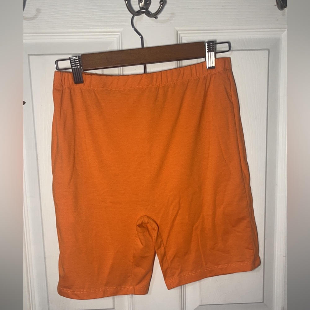 orange biker shorts
